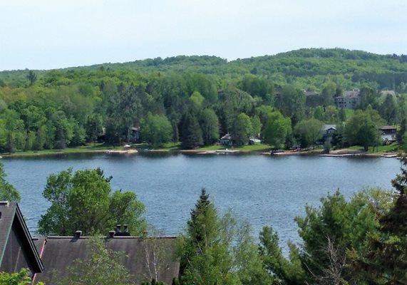image of cottages on a lake