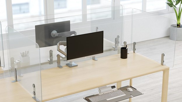Desk with clear dividers attached